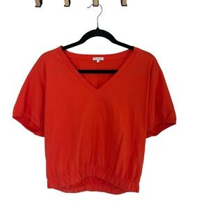 Orange cropped v neck top